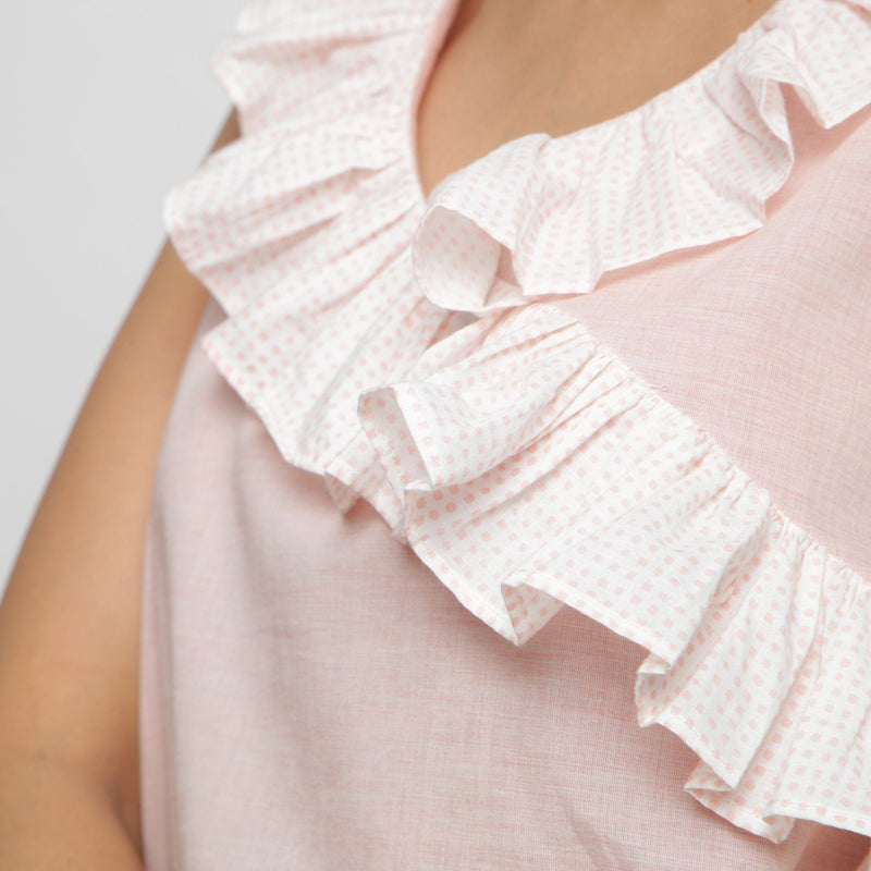 Front Detail of a Model wearing Pink Frilled Cotton Chambray Straight Top