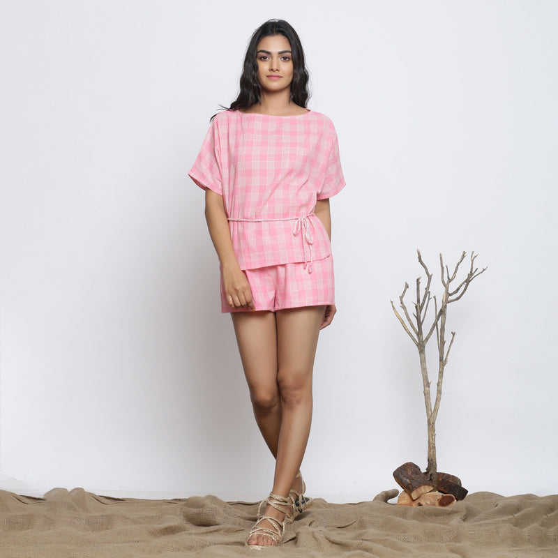 Front View of a Model wearing Pink Handspun Straight Top and Micro Shorts Set