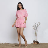 Front View of a Model wearing Pink Handspun Straight Top and Micro Shorts Set