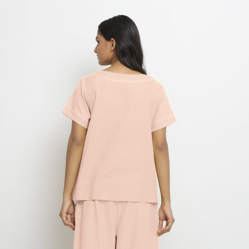 Back View of a Model wearing Vegetable-Dyed Pink 100% Cotton Paneled Top