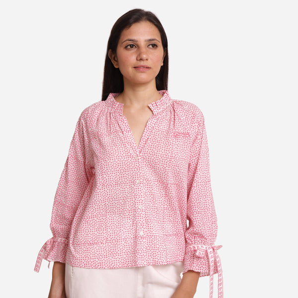 Front View of a Model wearing Pink Sanganeri Block Print V-Neck Blouse