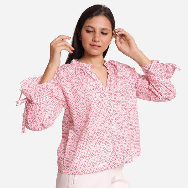 Right View of a Model wearing Pink Sanganeri Block Print V-Neck Blouse