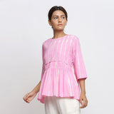 Front View of a Model wearing Pink Tie Dyed Flowy Cotton Gathered Top