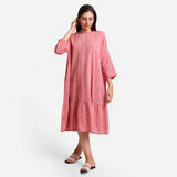 Front View of a Model wearing Pink Yarn Dyed Cotton Tier Dress