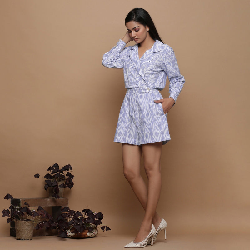 Left View of a Model wearing Powder Blue Cuff Sleeves Cotton Romper