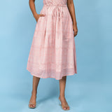 Front View of a Model wearing Powder Pink Block Printed 100% Cotton A-Line Skirt