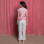 Back View of a Model wearing Powder Pink Chanderi A-Line Top