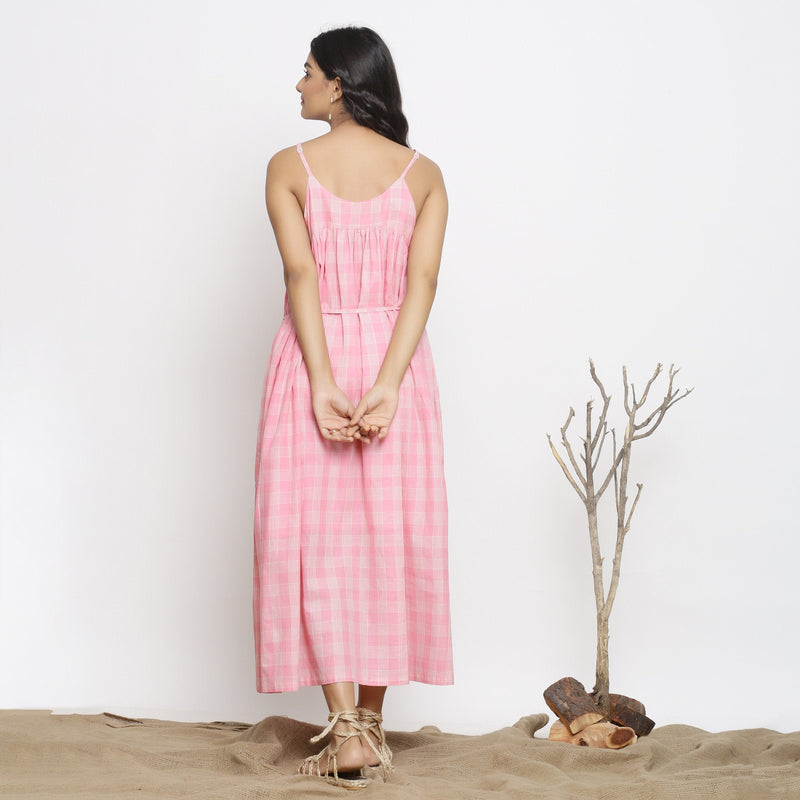 Back View of a Model wearing Powder Pink Gathered Maxi Yoked Dress