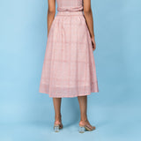 Back View of a Model wearing Powder Pink Block Printed 100% Cotton A-Line Skirt