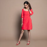 Front View of a Model wearing Red Cotton Velvet A-Line Panelled Dress