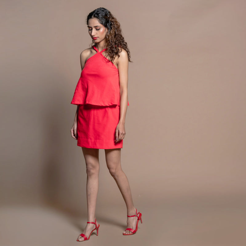 Left View of a Model wearing Red Cotton Velvet Twisted Top and Skirt Set