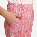 Right Detail of a Model wearing Red Crinkled Cotton Ankle Length Pant