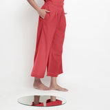Right View of a Model wearing Brick Red Vegetable Dyed 100% Cotton Wide Legged Pant