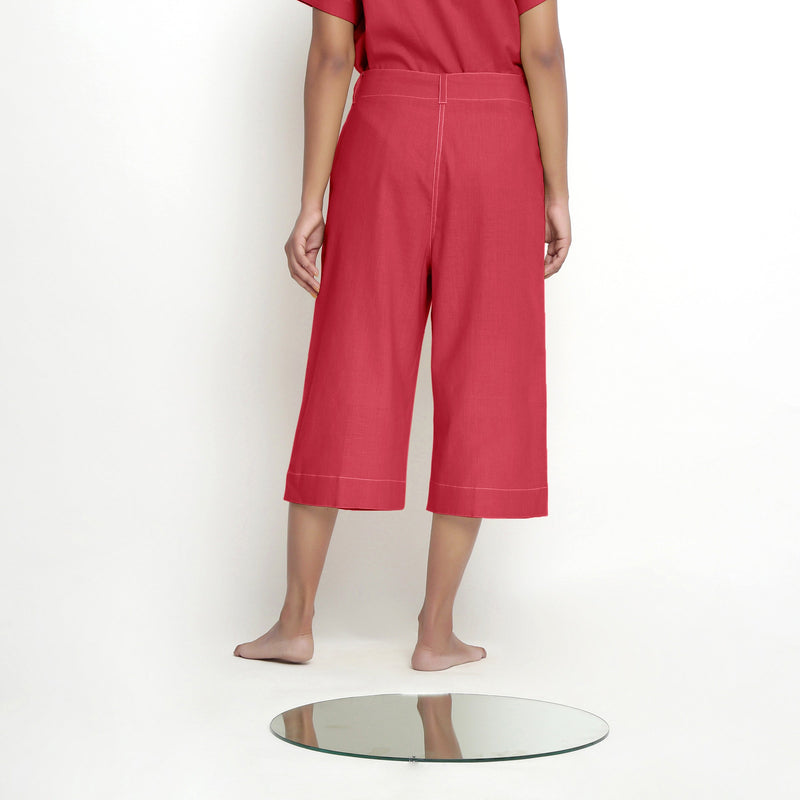 Back View of a Model wearing Mid-Rise Vegetable Dyed Red Cotton Culottes