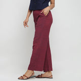 Left View of a Model wearing Red Polka Dots Straight Cotton Pant