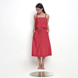 Front View of a Model wearing Red Spaghetti Top and Brick Red Skirt Set