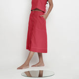 Left View of a Model wearing Brick Red Vegetable Dyed Button-Down Skirt
