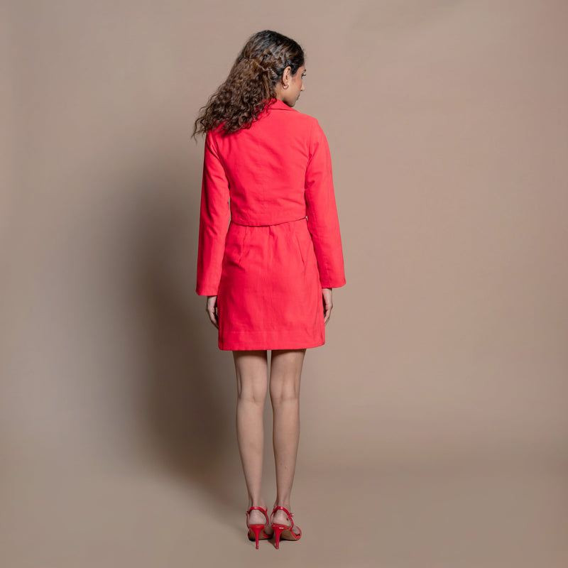 Back View of a Model wearing Red Velvet Mini Skirt and Crop Blazer Set