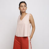 Left View of a Model wearing Vegetable Dyed Pink Deep Neck Top