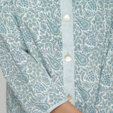 Front Detail of a Model wearing Reversible Green Button-Down Outerwear