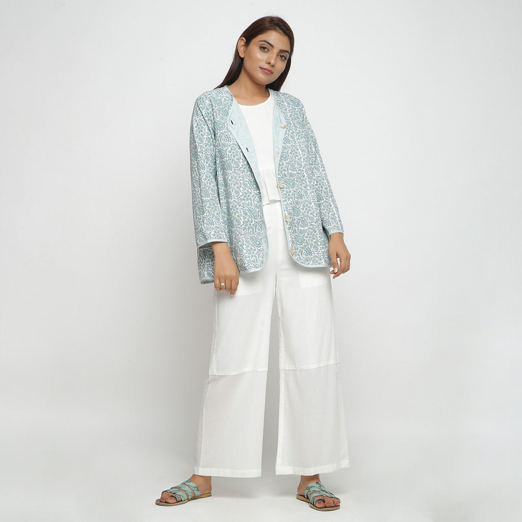 Front View of a Model wearing Reversible Green Button-Down Outerwear