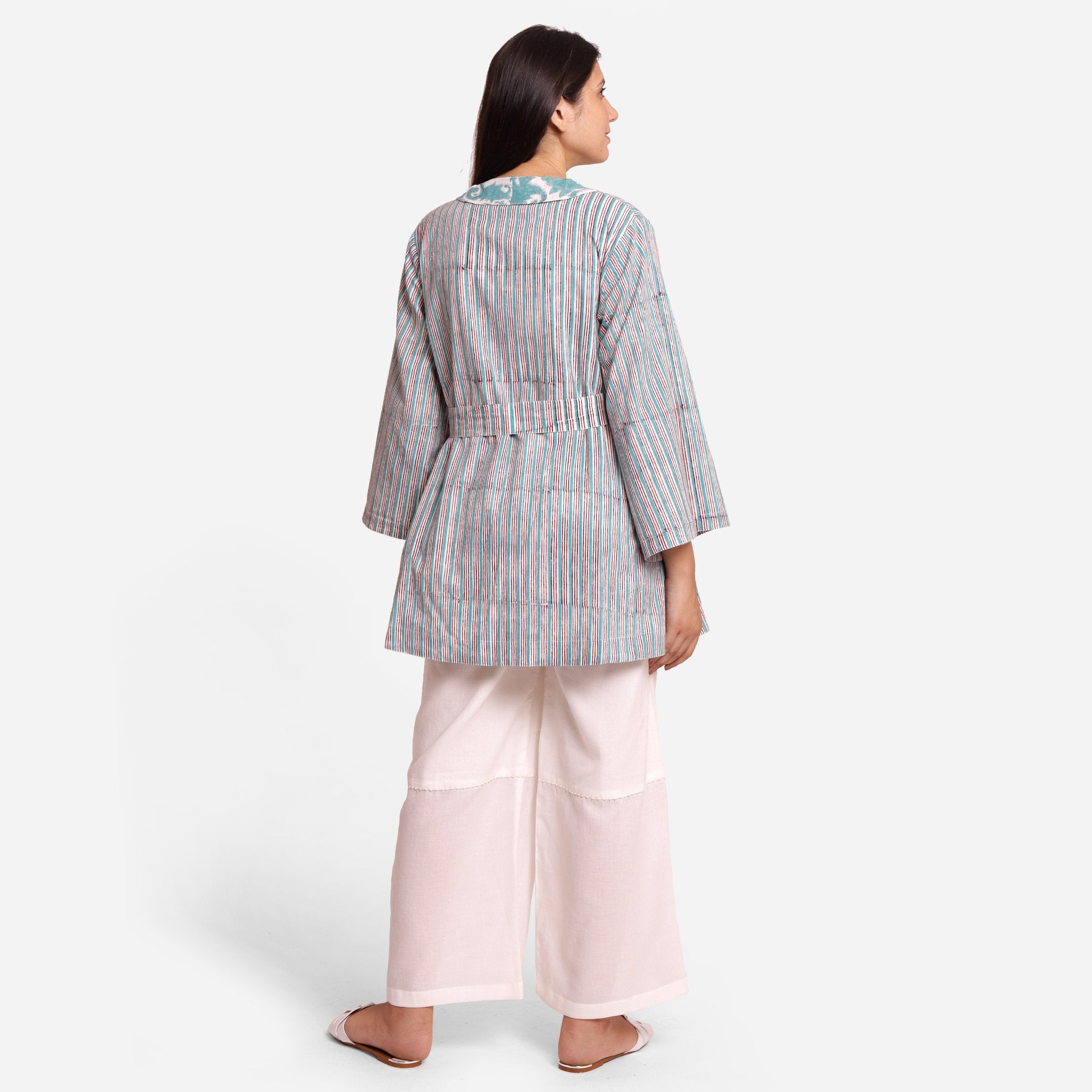 Back View of a Model wearing Reversible Handblock Printed Overlay