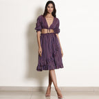 Front View of a Model wearing Reversible Plunge Neck Top and Wrap Skirt Set