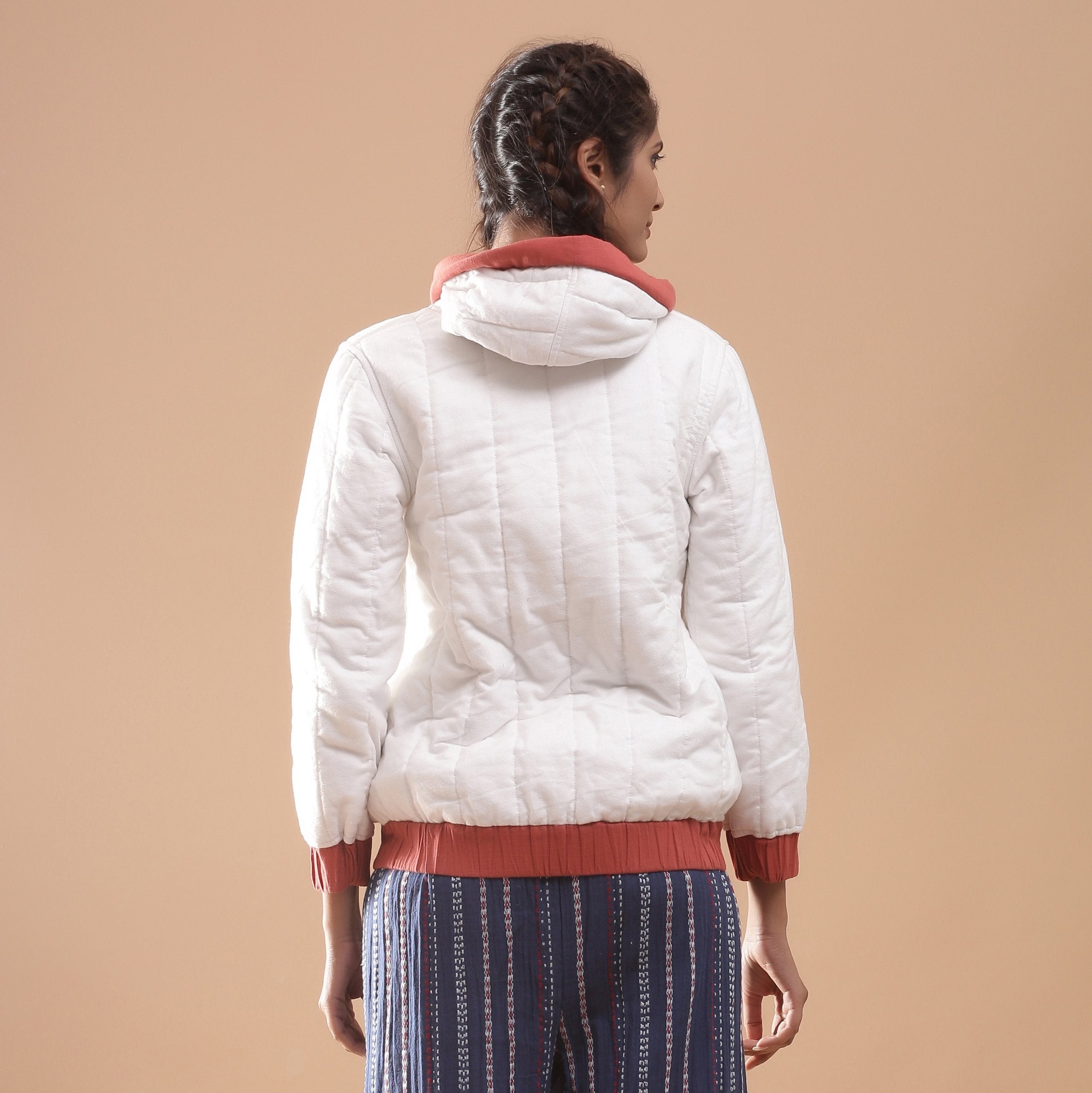 Back View of a Model wearing Reversible Quilted Cotton Bomber Jacket