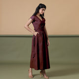 Right View of a Model wearing Reversible Maroon Tie-Dye Cotton V-Neck Maxi Wrap Dress