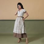 Front View of a Model wearing Taupe Shibori Front Open Overlay