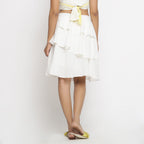 Back View of a Model Wearing Off-White Cotton Dobby Ruffled Skirt