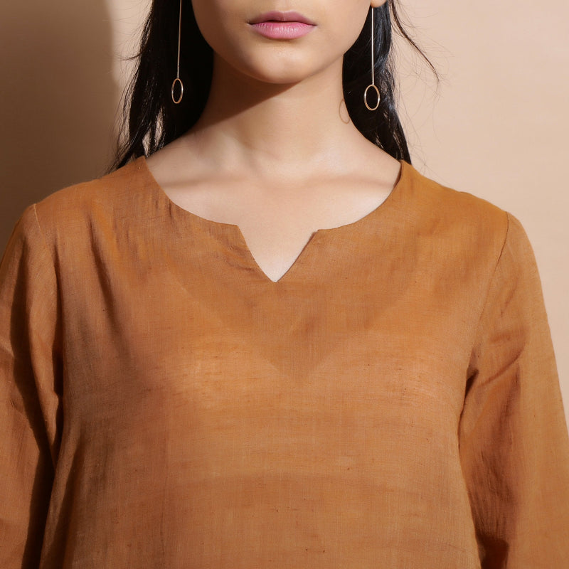Front Detail of a Model wearing Rust Cotton Muslin Solid Handspun Top
