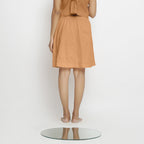 Back View of a Model wearing Vegetable-Dyed Rust 100% Cotton Mid-Rise Skirt