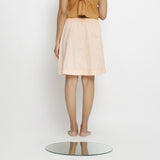 Back View of a Model wearing Vegetable Dyed Powder Pink Mid Rise Skirt