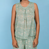 Front Detail of a Model wearing Sage Green Block Printed 100% Cotton Pleated Top