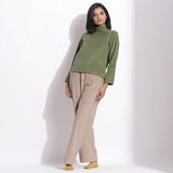 Front View of a Model wearing Sage Green Corduroy High Neck Top