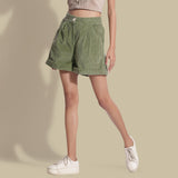 Front View of a Model wearing Sage Green Cotton Corduroy Baggy Shorts
