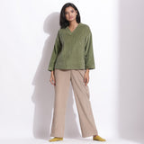 Front View of a Model wearing Sage Green Cotton Corduroy V-Neck Top