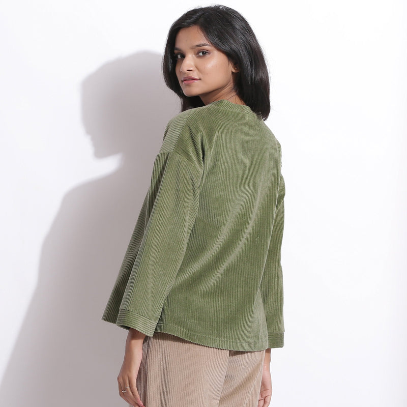 Back View of a Model wearing Sage Green Cotton Corduroy V-Neck Top