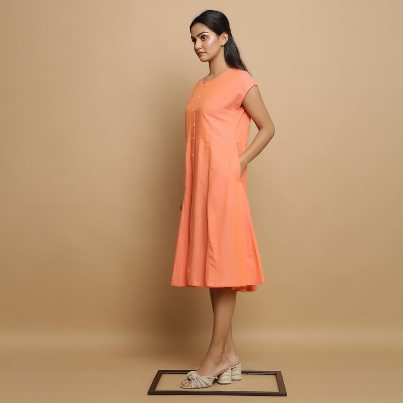 Left View of a Model wearing Salmon Pink Cotton Button-Down Dress