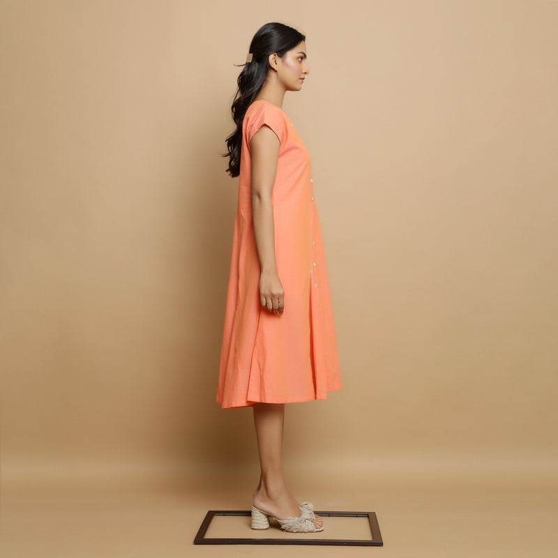 Right View of a Model wearing Salmon Pink Cotton Button-Down Dress