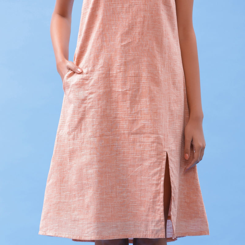 Front Detail of a Model wearing Salmon Pink Handspun Cotton Strap Slit Dress