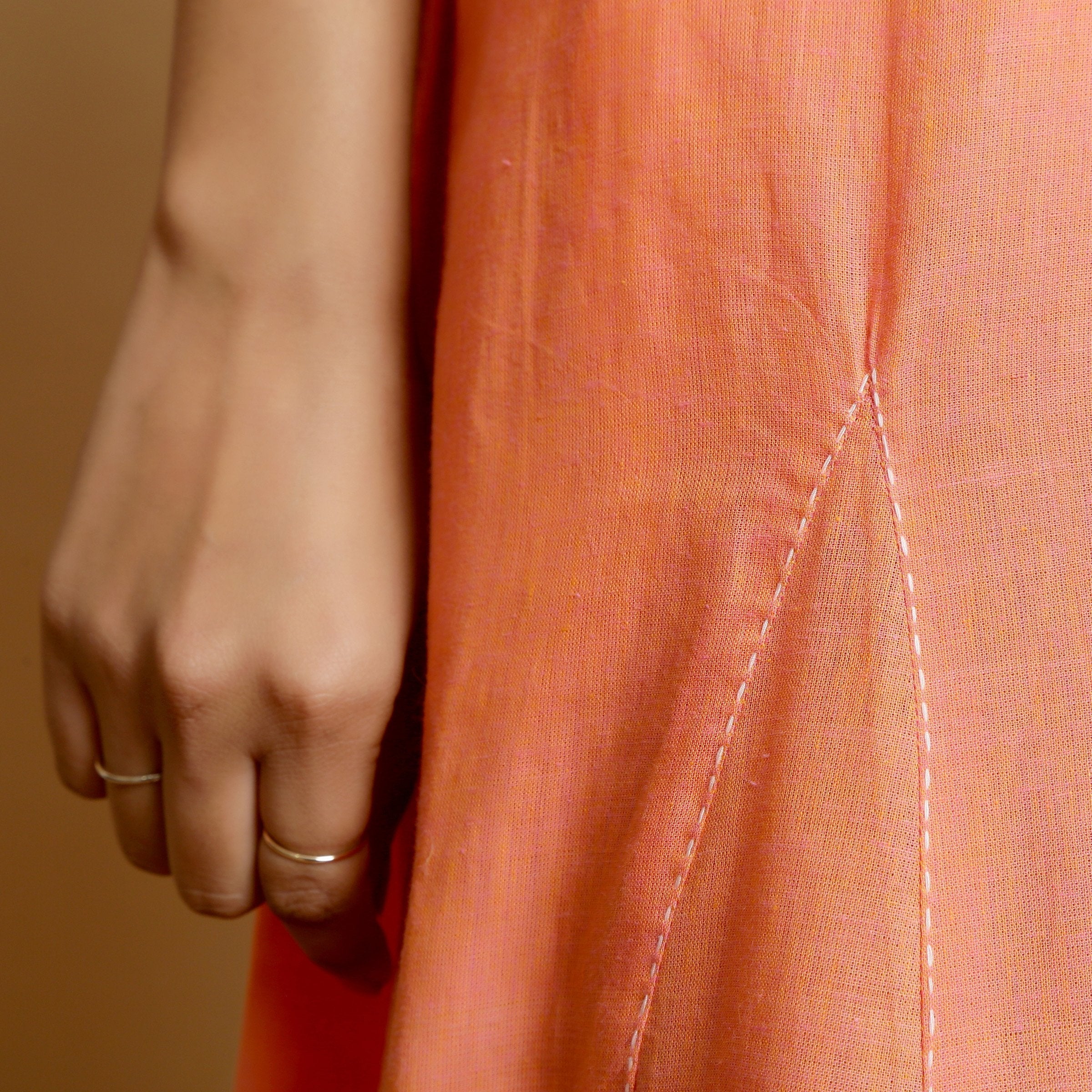 Close View of a Model wearing Salmon Pink Mangalgiri Cotton Flared Dress
