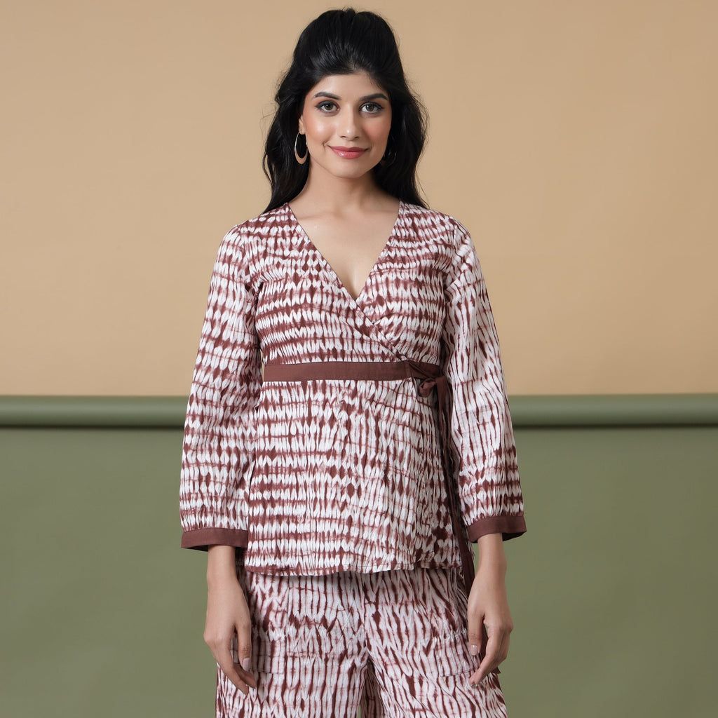 Front View of a Model wearing Sangria Wine Shibori Wrap Top