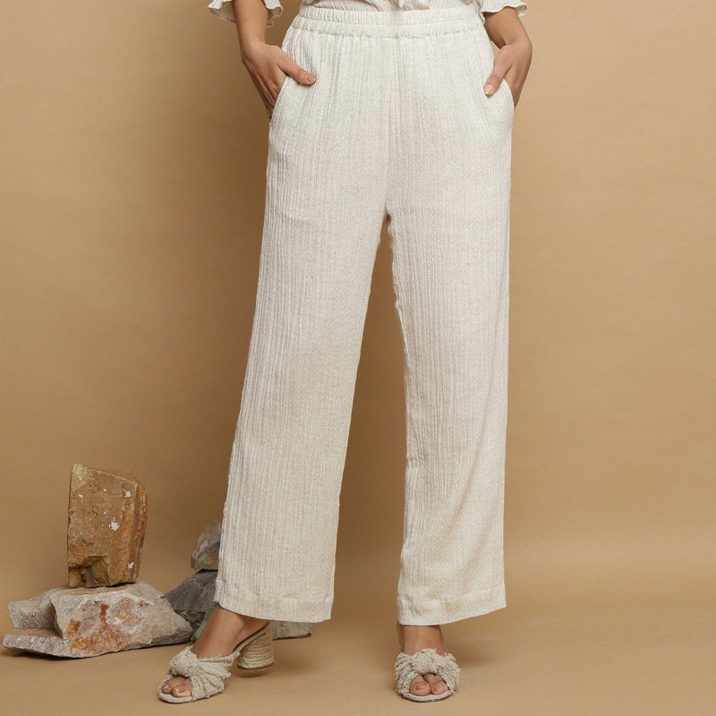 Front View of a Model wearing Undyed Elasticated Mid Rise Ecru Pant