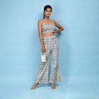 Front View of a Model wearing Slate Blue Bustier Top and Bootcut Pant Set