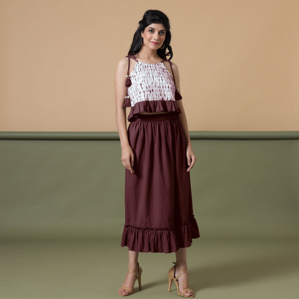 Front View of a Model wearing Maroon Cami Top and Ruffled Skirt Set