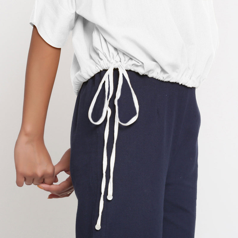 Right Detail of a Model wearing Solid White Cotton Flax Blouson Top
