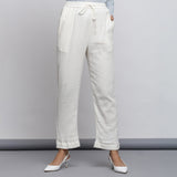 Front View of a Model wearing Off-White Crinkled Cotton Tapered Pant
