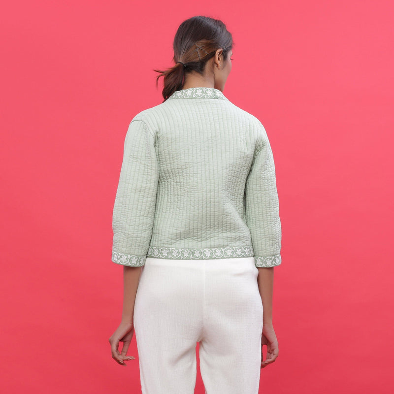 Back View of a Model wearing Green Reversible Quilted Cotton Shrug